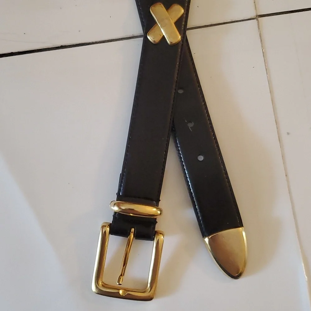 New without tags womens X black leather belt in size S, M & L